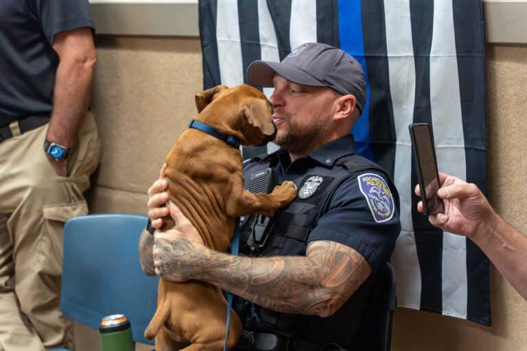 Benson with Rochester Police officers
